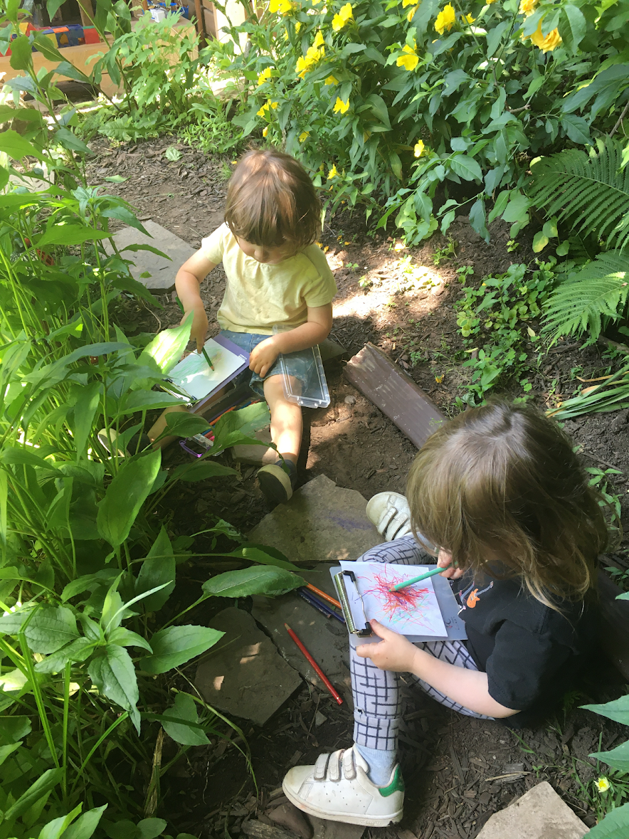 Kids playing with a teacher